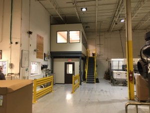 Side view of mezzanine and modular office.