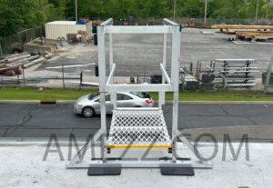 Photo of A-Mezz MRL aluminum ladder with weighted bases and safety gate