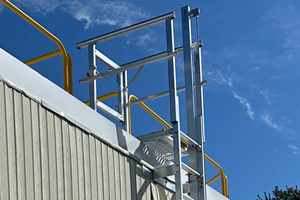 Modular aluminum fixed ladder with platform and fall arrest system