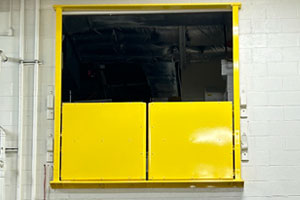 photo of self-closing pallet gate used at doorway opening
